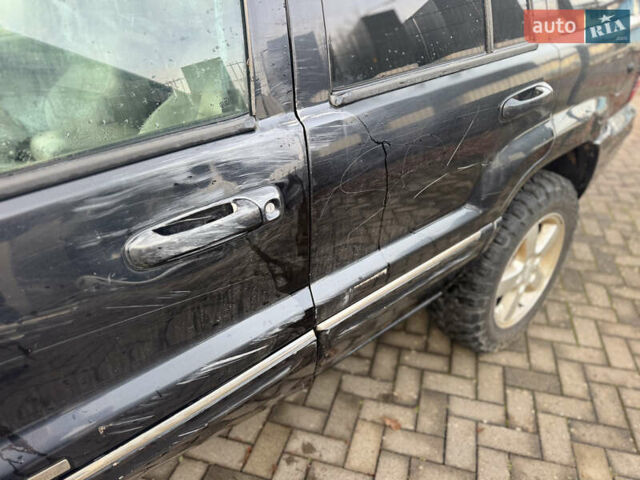 Черный Джип Гранд Чероки, объемом двигателя 2.7 л и пробегом 221 тыс. км за 3142 $, фото 9 на Automoto.ua