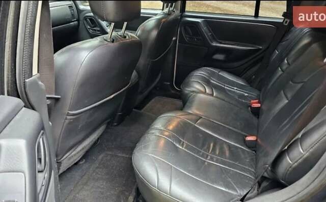 Черный Джип Гранд Чероки, объемом двигателя 0 л и пробегом 243 тыс. км за 4594 $, фото 5 на Automoto.ua