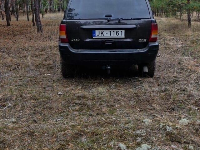 Черный Джип Гранд Чероки, объемом двигателя 2.7 л и пробегом 300 тыс. км за 5800 $, фото 2 на Automoto.ua