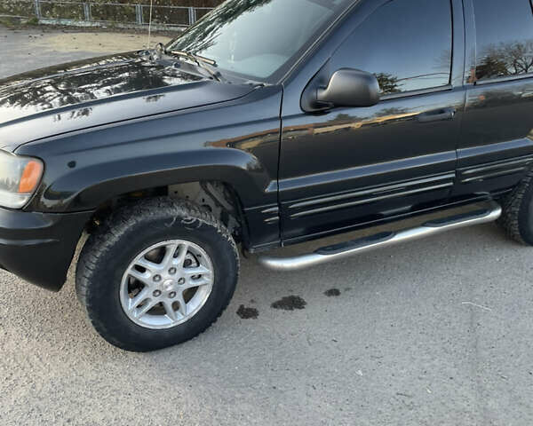 Чорний Джип Grand Cherokee, об'ємом двигуна 4 л та пробігом 120 тис. км за 5900 $, фото 18 на Automoto.ua