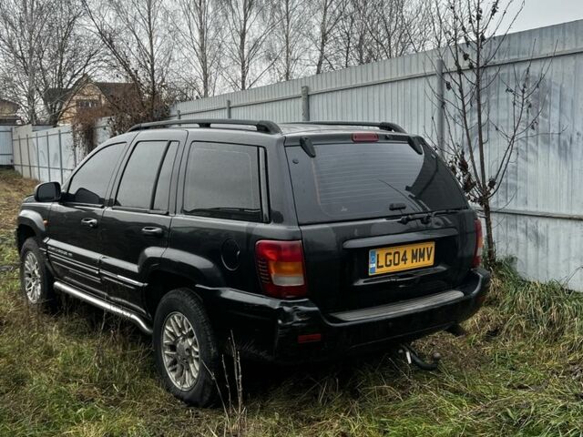 Чорний Джип Grand Cherokee, об'ємом двигуна 2.7 л та пробігом 300 тис. км за 2251 $, фото 2 на Automoto.ua