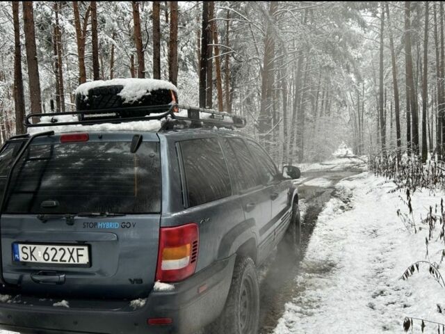 Чорний Джип Grand Cherokee, об'ємом двигуна 2.7 л та пробігом 231 тис. км за 3019 $, фото 1 на Automoto.ua