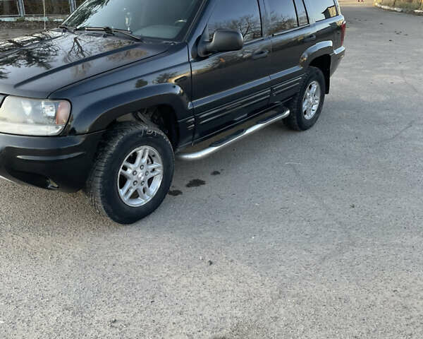 Чорний Джип Grand Cherokee, об'ємом двигуна 4 л та пробігом 120 тис. км за 5900 $, фото 19 на Automoto.ua