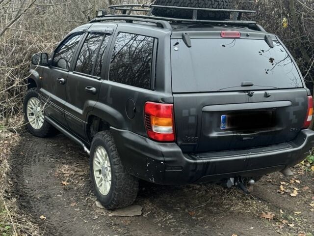 Черный Джип Гранд Чероки, объемом двигателя 2.7 л и пробегом 370 тыс. км за 6000 $, фото 4 на Automoto.ua
