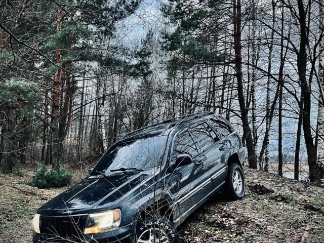 Чорний Джип Grand Cherokee, об'ємом двигуна 0.47 л та пробігом 400 тис. км за 6500 $, фото 1 на Automoto.ua