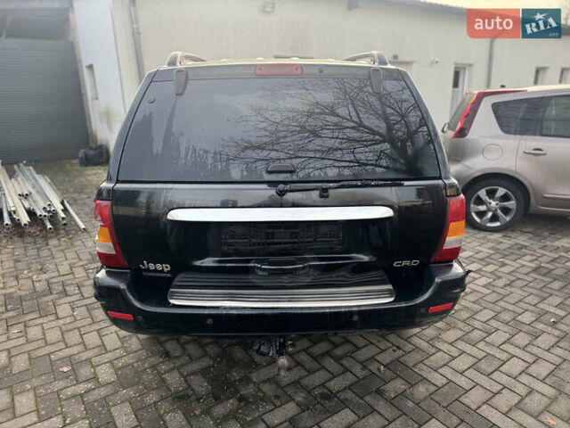Черный Джип Гранд Чероки, объемом двигателя 2.7 л и пробегом 221 тыс. км за 3142 $, фото 6 на Automoto.ua