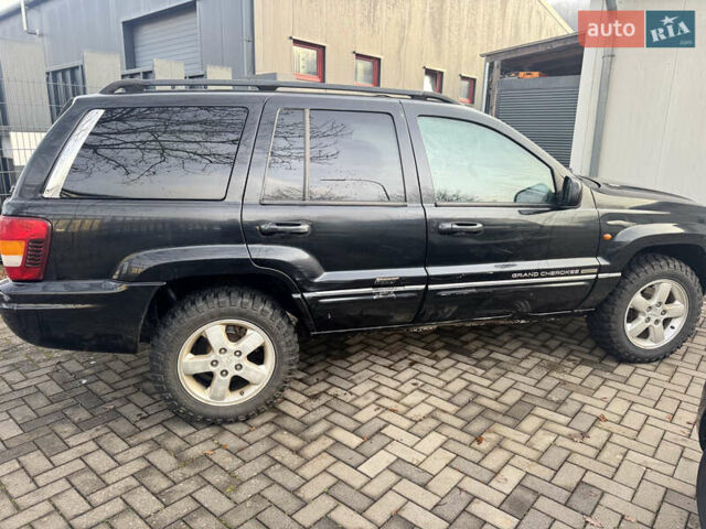 Черный Джип Гранд Чероки, объемом двигателя 2.7 л и пробегом 221 тыс. км за 3142 $, фото 10 на Automoto.ua