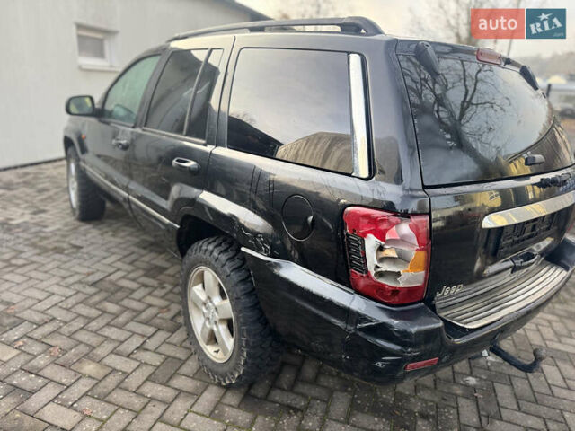 Черный Джип Гранд Чероки, объемом двигателя 2.7 л и пробегом 221 тыс. км за 3142 $, фото 4 на Automoto.ua