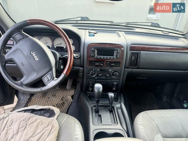 Черный Джип Гранд Чероки, объемом двигателя 2.7 л и пробегом 221 тыс. км за 3142 $, фото 22 на Automoto.ua