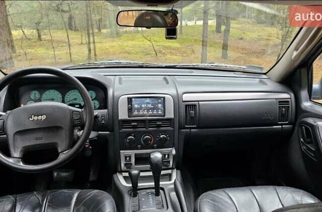 Черный Джип Гранд Чероки, объемом двигателя 0 л и пробегом 243 тыс. км за 4594 $, фото 4 на Automoto.ua