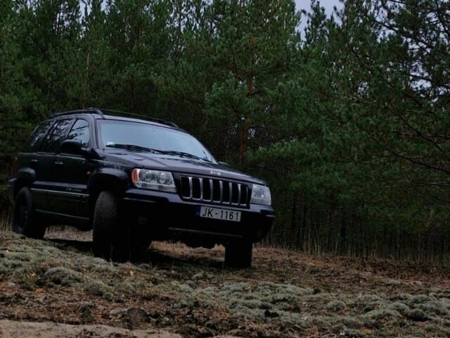 Черный Джип Гранд Чероки, объемом двигателя 2.7 л и пробегом 300 тыс. км за 5800 $, фото 1 на Automoto.ua