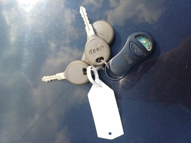 Черный Джип Гранд Чероки, объемом двигателя 2.7 л и пробегом 156 тыс. км за 6000 $, фото 6 на Automoto.ua