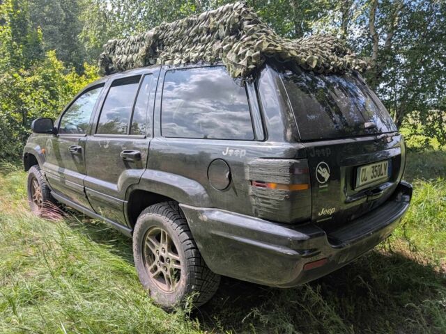 Черный Джип Гранд Чероки, объемом двигателя 2.7 л и пробегом 213 тыс. км за 5250 $, фото 3 на Automoto.ua