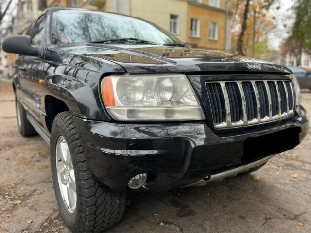 Черный Джип Гранд Чероки, объемом двигателя 2.7 л и пробегом 156 тыс. км за 6000 $, фото 4 на Automoto.ua