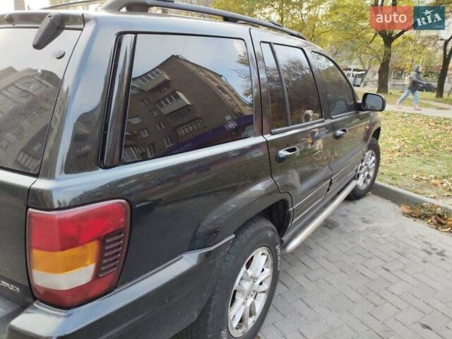 Черный Джип Гранд Чероки, объемом двигателя 2.69 л и пробегом 320 тыс. км за 6500 $, фото 4 на Automoto.ua