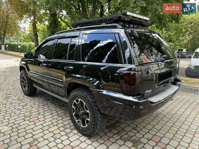 Чорний Джип Grand Cherokee, об'ємом двигуна 2.69 л та пробігом 286 тис. км за 16000 $, фото 6 на Automoto.ua