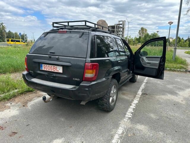 Чорний Джип Grand Cherokee, об'ємом двигуна 0 л та пробігом 111 тис. км за 5500 $, фото 1 на Automoto.ua
