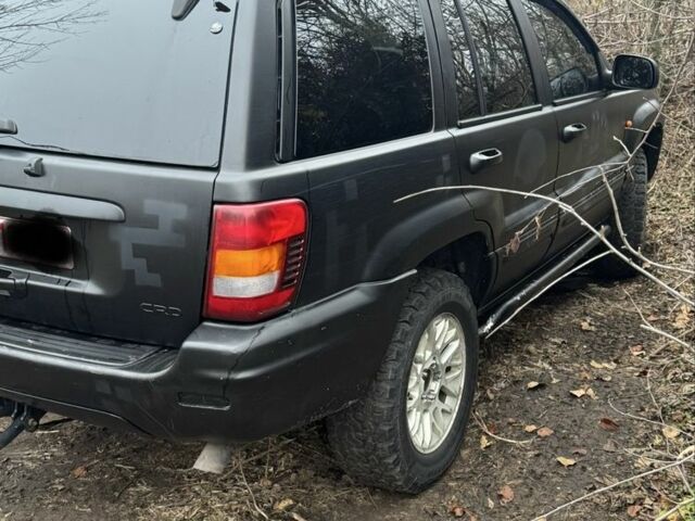 Черный Джип Гранд Чероки, объемом двигателя 2.7 л и пробегом 370 тыс. км за 6000 $, фото 5 на Automoto.ua