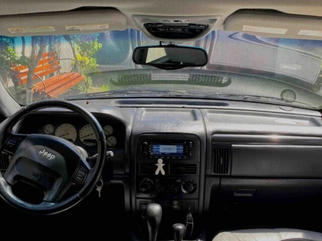 Черный Джип Гранд Чероки, объемом двигателя 2.7 л и пробегом 500 тыс. км за 7500 $, фото 3 на Automoto.ua