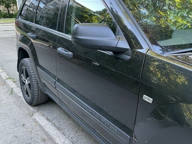 Чорний Джип Grand Cherokee, об'ємом двигуна 3 л та пробігом 362 тис. км за 9000 $, фото 1 на Automoto.ua