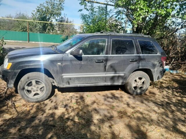 Джип Гранд Чероки 2005 в Синельниковом на Automoto.ua Черный Джип Гранд Чероки, объемом двигателя 3 л и пробегом 290 тыс. км за 5500 $, фото 1 на Automoto.ua