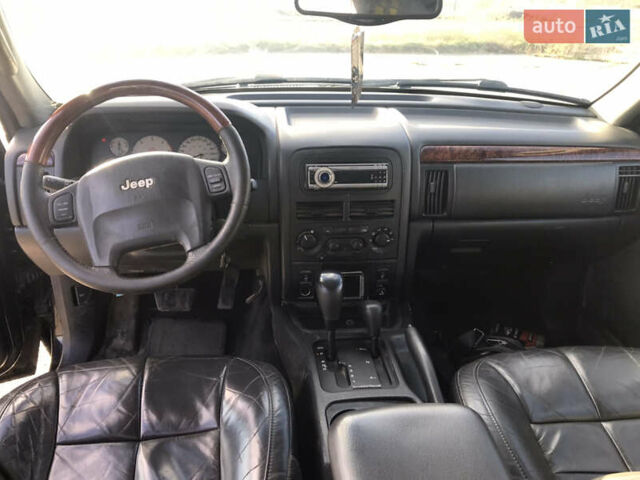 Черный Джип Гранд Чероки, объемом двигателя 2.7 л и пробегом 280 тыс. км за 4999 $, фото 13 на Automoto.ua