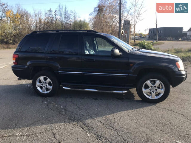 Черный Джип Гранд Чероки, объемом двигателя 2.7 л и пробегом 280 тыс. км за 4999 $, фото 5 на Automoto.ua