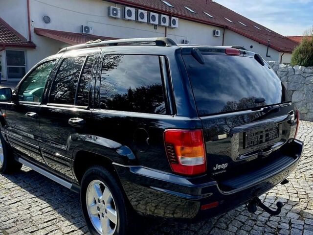 Черный Джип Гранд Чероки, объемом двигателя 2.7 л и пробегом 323 тыс. км за 2450 $, фото 4 на Automoto.ua