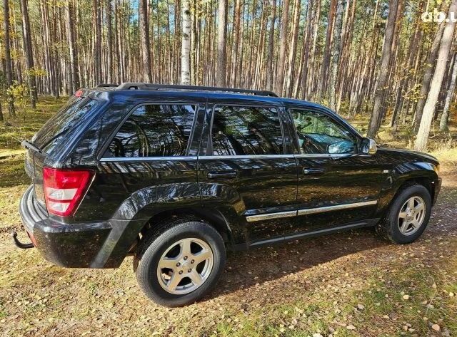 Чорний Джип Grand Cherokee, об'ємом двигуна 3 л та пробігом 235 тис. км за 2550 $, фото 1 на Automoto.ua