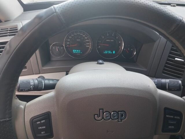 Черный Джип Гранд Чероки, объемом двигателя 3 л и пробегом 300 тыс. км за 5500 $, фото 5 на Automoto.ua