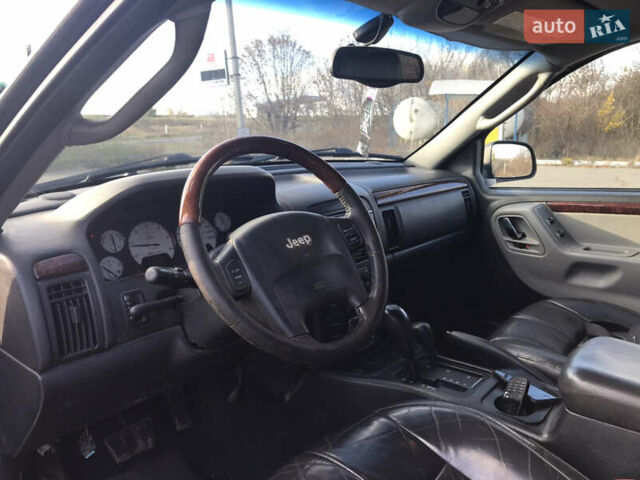 Черный Джип Гранд Чероки, объемом двигателя 2.7 л и пробегом 280 тыс. км за 4999 $, фото 12 на Automoto.ua