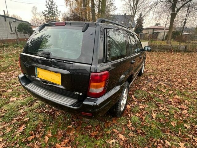 Чорний Джип Grand Cherokee, об'ємом двигуна 2.7 л та пробігом 109 тис. км за 3600 $, фото 2 на Automoto.ua