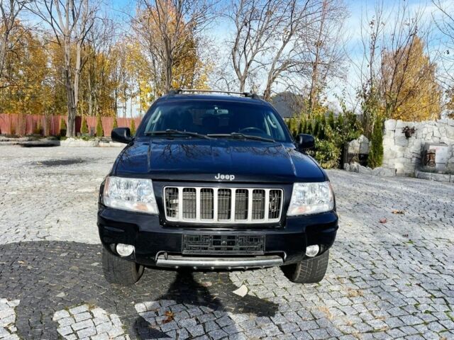 Черный Джип Гранд Чероки, объемом двигателя 2.7 л и пробегом 323 тыс. км за 2450 $, фото 1 на Automoto.ua