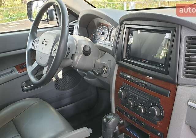 Черный Джип Гранд Чероки, объемом двигателя 5.65 л и пробегом 158 тыс. км за 12300 $, фото 28 на Automoto.ua