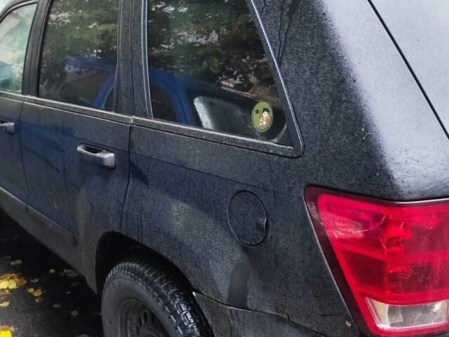 Чорний Джип Grand Cherokee, об'ємом двигуна 3 л та пробігом 300 тис. км за 3300 $, фото 4 на Automoto.ua