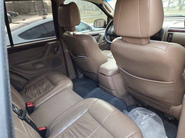 Черный Джип Гранд Чероки, объемом двигателя 2.7 л и пробегом 320 тыс. км за 7000 $, фото 7 на Automoto.ua