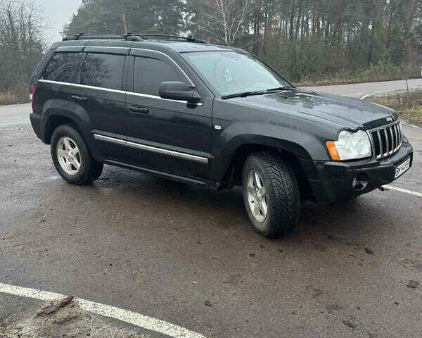 Чорний Джип Grand Cherokee, об'ємом двигуна 3 л та пробігом 366 тис. км за 9700 $, фото 1 на Automoto.ua