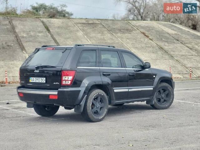 Чорний Джип Grand Cherokee, об'ємом двигуна 4.7 л та пробігом 230 тис. км за 9700 $, фото 1 на Automoto.ua