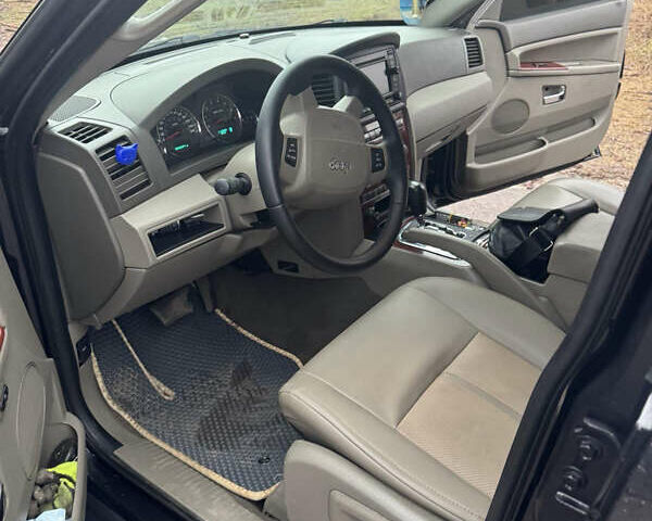 Чорний Джип Grand Cherokee, об'ємом двигуна 3 л та пробігом 366 тис. км за 9700 $, фото 8 на Automoto.ua