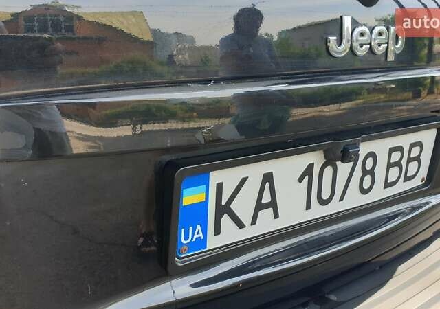 Черный Джип Гранд Чероки, объемом двигателя 5.65 л и пробегом 158 тыс. км за 12300 $, фото 30 на Automoto.ua