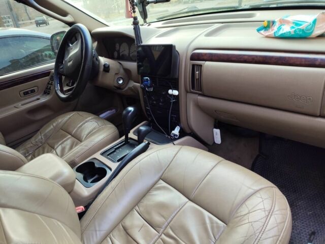 Черный Джип Гранд Чероки, объемом двигателя 2.7 л и пробегом 320 тыс. км за 7000 $, фото 5 на Automoto.ua