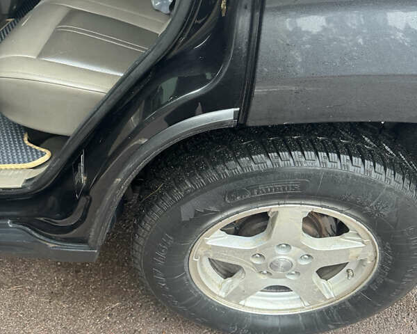 Чорний Джип Grand Cherokee, об'ємом двигуна 3 л та пробігом 366 тис. км за 9700 $, фото 11 на Automoto.ua
