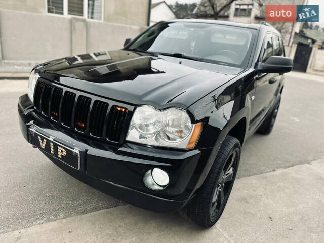 Чорний Джип Grand Cherokee, об'ємом двигуна 3 л та пробігом 254 тис. км за 9450 $, фото 143 на Automoto.ua