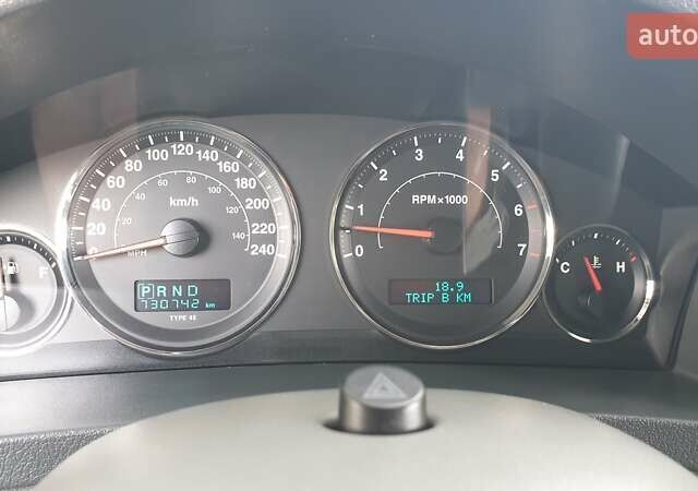 Черный Джип Гранд Чероки, объемом двигателя 5.65 л и пробегом 158 тыс. км за 12300 $, фото 17 на Automoto.ua