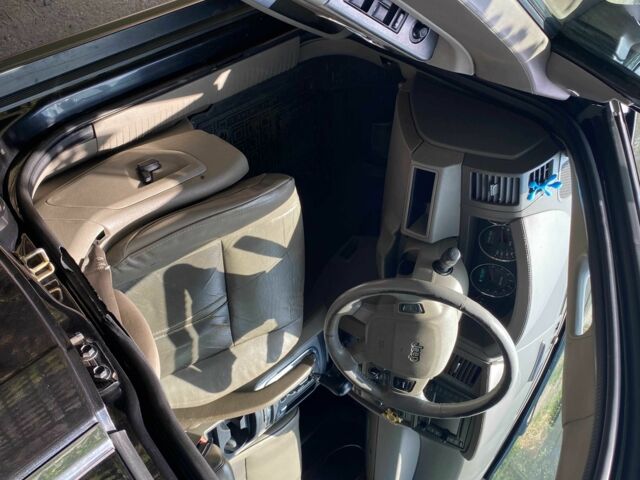Чорний Джип Grand Cherokee, об'ємом двигуна 3 л та пробігом 296 тис. км за 6800 $, фото 4 на Automoto.ua