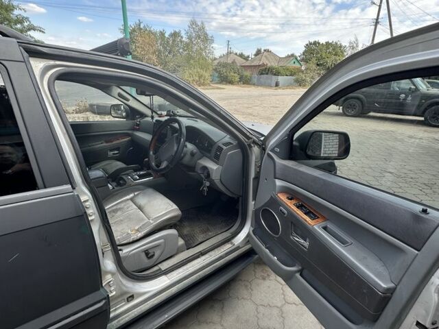Чорний Джип Grand Cherokee, об'ємом двигуна 3 л та пробігом 300 тис. км за 4000 $, фото 3 на Automoto.ua