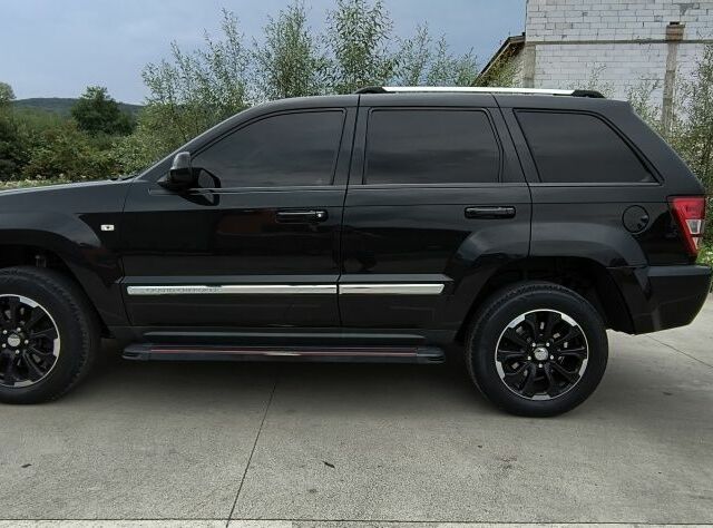 Чорний Джип Grand Cherokee, об'ємом двигуна 3 л та пробігом 223 тис. км за 12000 $, фото 1 на Automoto.ua