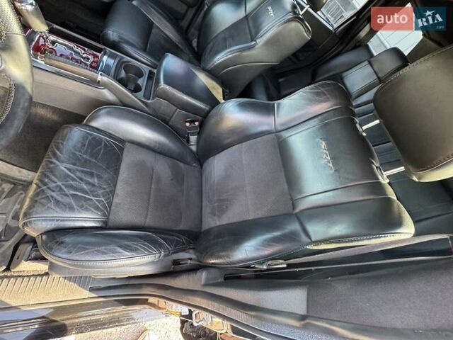 Черный Джип Гранд Чероки, объемом двигателя 6.06 л и пробегом 129 тыс. км за 27000 $, фото 12 на Automoto.ua