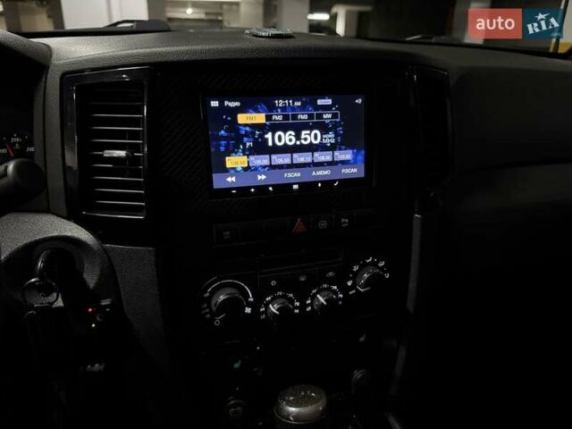 Черный Джип Гранд Чероки, объемом двигателя 6.06 л и пробегом 132 тыс. км за 19999 $, фото 51 на Automoto.ua