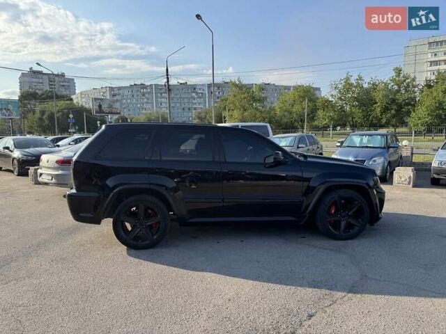 Черный Джип Гранд Чероки, объемом двигателя 6.06 л и пробегом 129 тыс. км за 27000 $, фото 3 на Automoto.ua